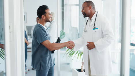 Doctors-teamwork,-tablet-and-handshake-in-hospital