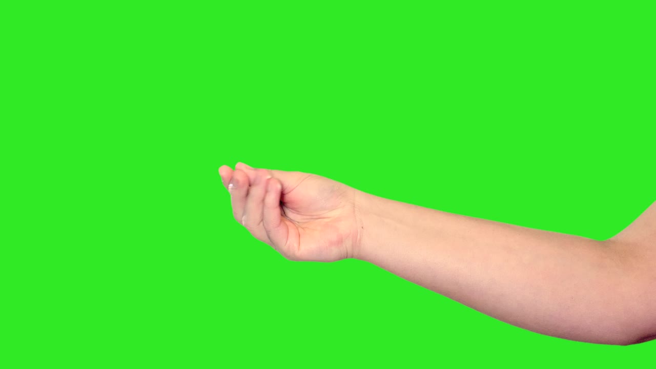 녹색 화면 앞에 있는 여성 손의 손 표시.