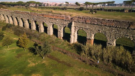 aerial pullback reveals claudio aqueduct, ancient roman architecture