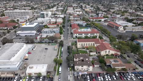 aerial view of church, school and establishments at glendale city in los angeles county, california