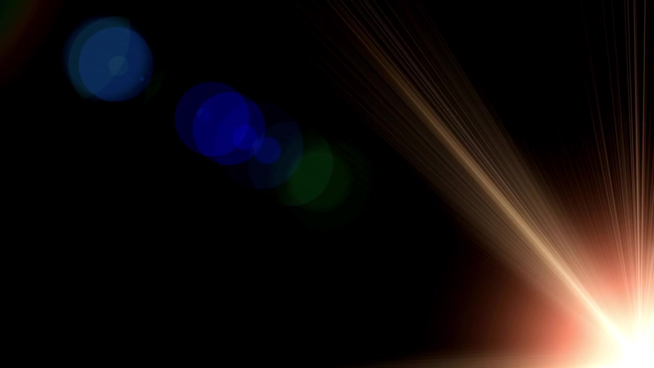 Transizione dinamica di lens flare colorati su sfondo nero
