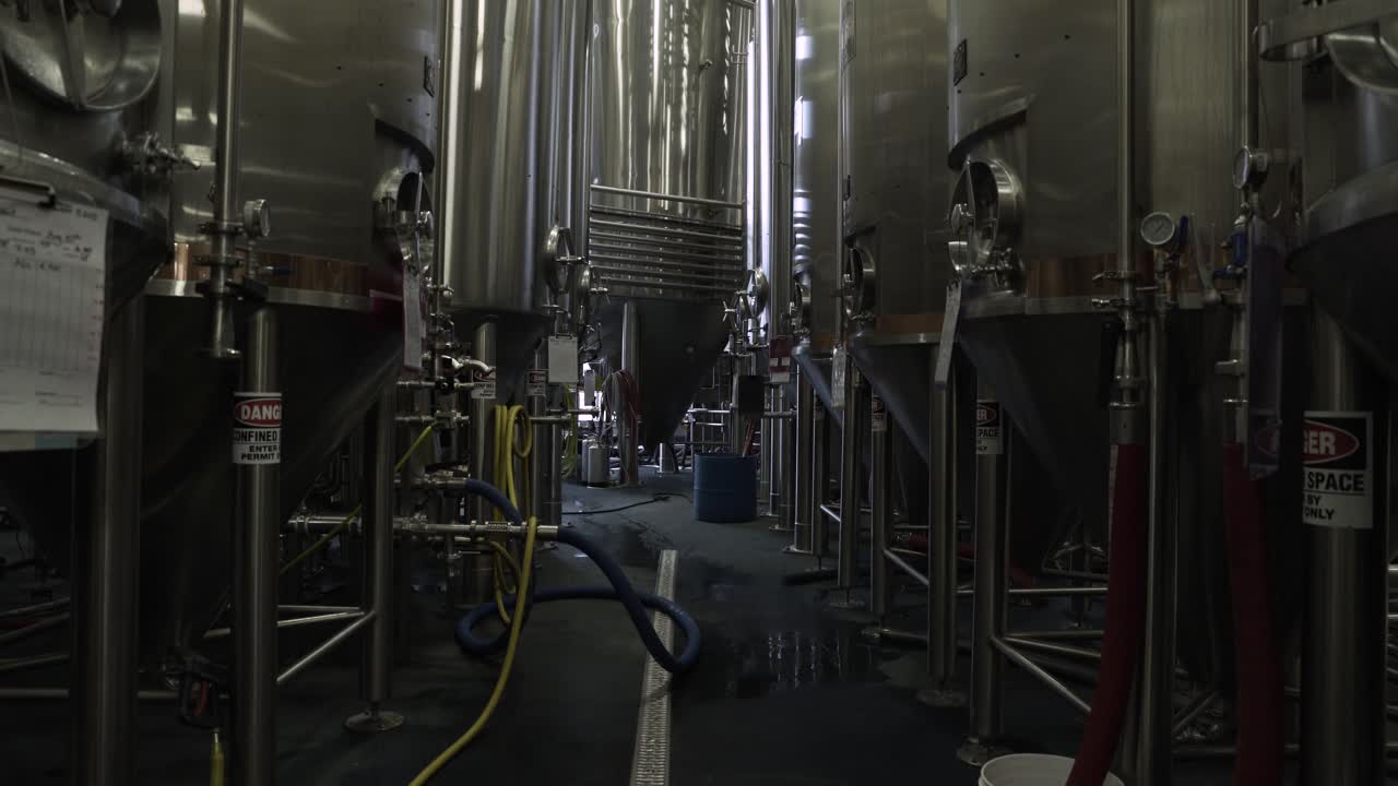 Line of brew kettles for beer in a large brewery