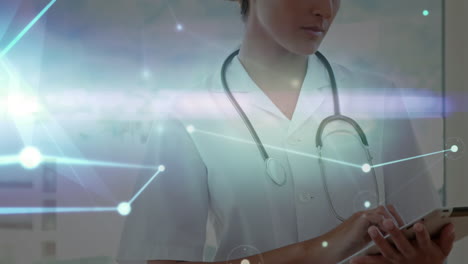 animation of dots interconnecting with lines over smiling caucasian female doctor using tablet