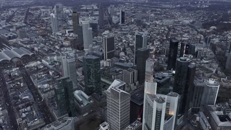 high angle view of city. downtown skyscrapers in financial hub and train station in background. frankfurt am main, germany