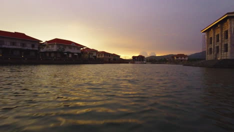dolly in aerial footage of lake in las casas filipinas de acuzar