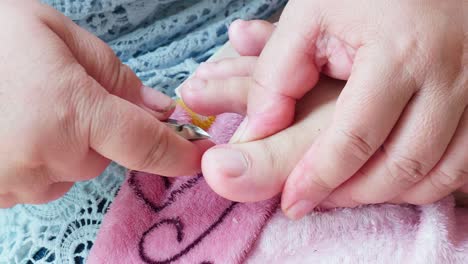 cosmetologist beautician is making pedicures in cosmetology clinic