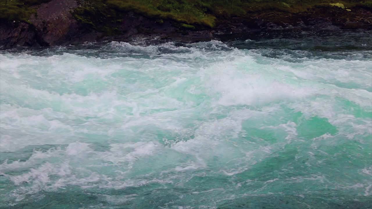 Mountain river water with slow motion closeup