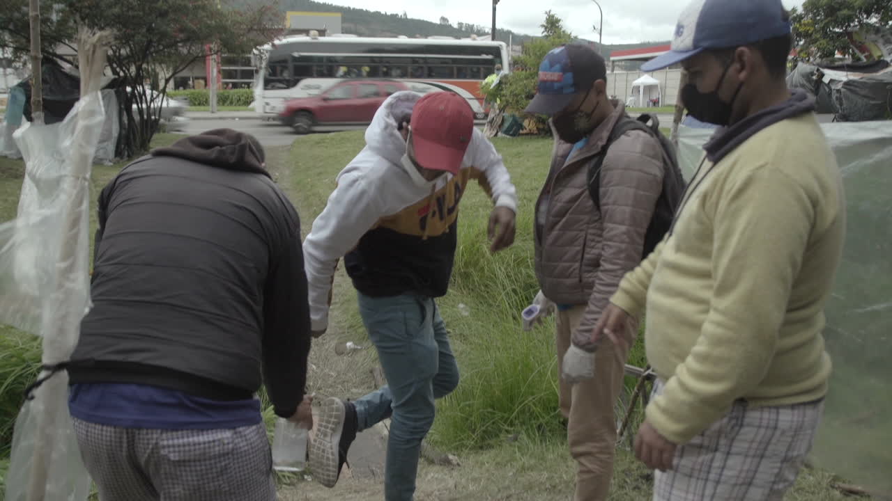 Venezuelan migrants camp in Bogota. After not being able to pay their rents, many try to go back to their country but they have to wait by the highway because of the quarantine in the city