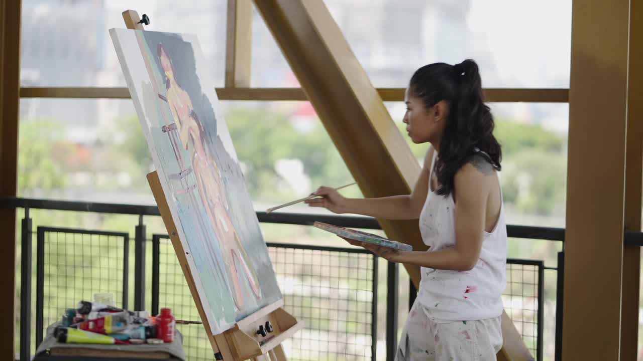 Female Artist Painting on an Easel in an Urban Setting