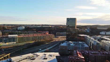 newly built building of garda vesta with traffic at european route e6 in gullbergsbrogatan, gothenburg, sweden