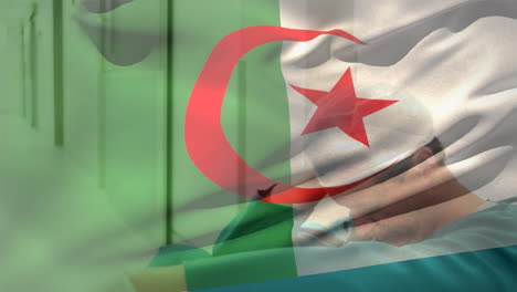 digital composition of algeria flag waving against stressed caucasian male surgeon at hospital