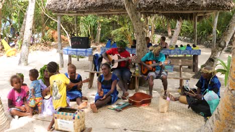 local band playing traditional music in mystery island, vanuatu.