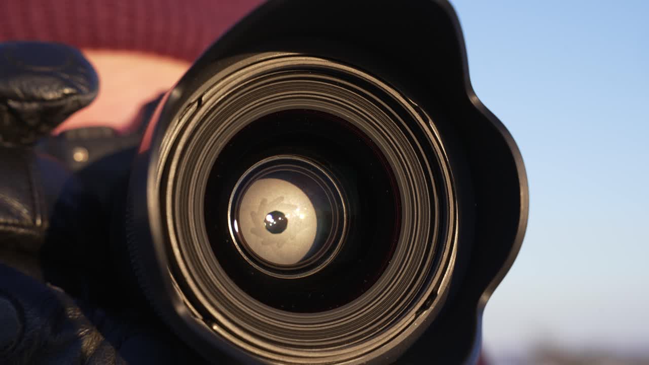 Close up of a camera lens and aperature.