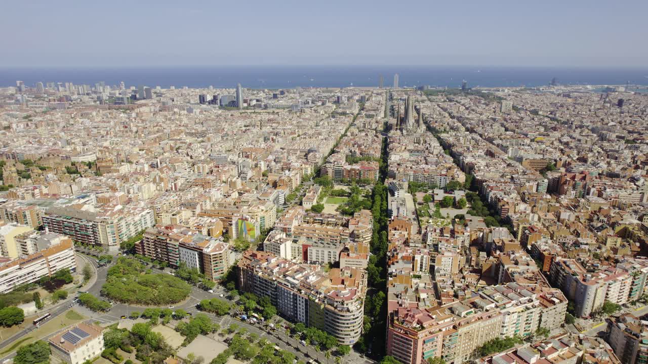 Aerial View of Barcelona Cityscape with Sagrada Familia and Mediterranean Sea