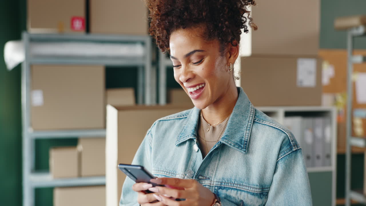 Woman using phone in business