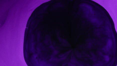 black hole expanding in purple abstract art fluid