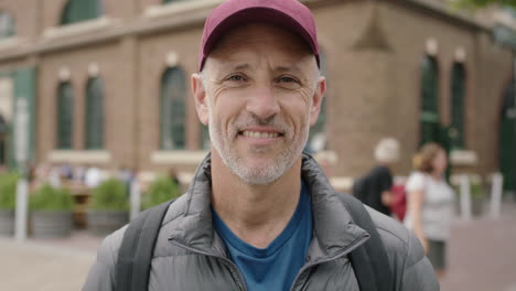 portrait-of-mature-attractive-caucasian-man-smiling-optimistic-enjoying-travel-vacation