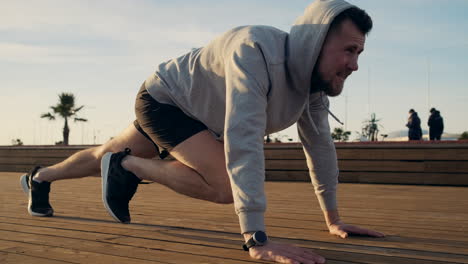 man doing push-ups outdoors