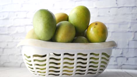 fresh mangoes in a basket