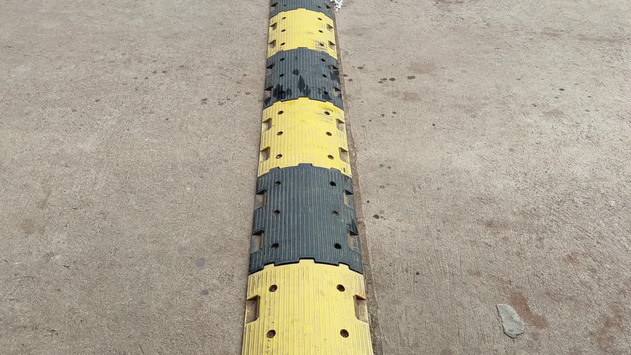 Speed Bump on Asphalt Road