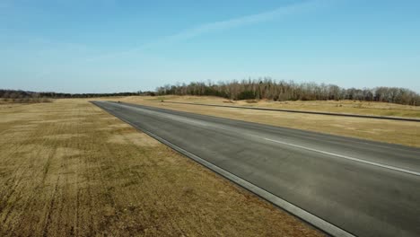 small aircraft taking off from runway
