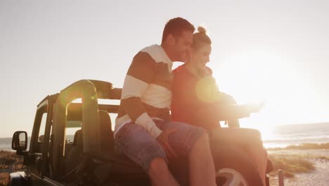 Couple-in-love-enjoying-free-time-on-road-trip-together