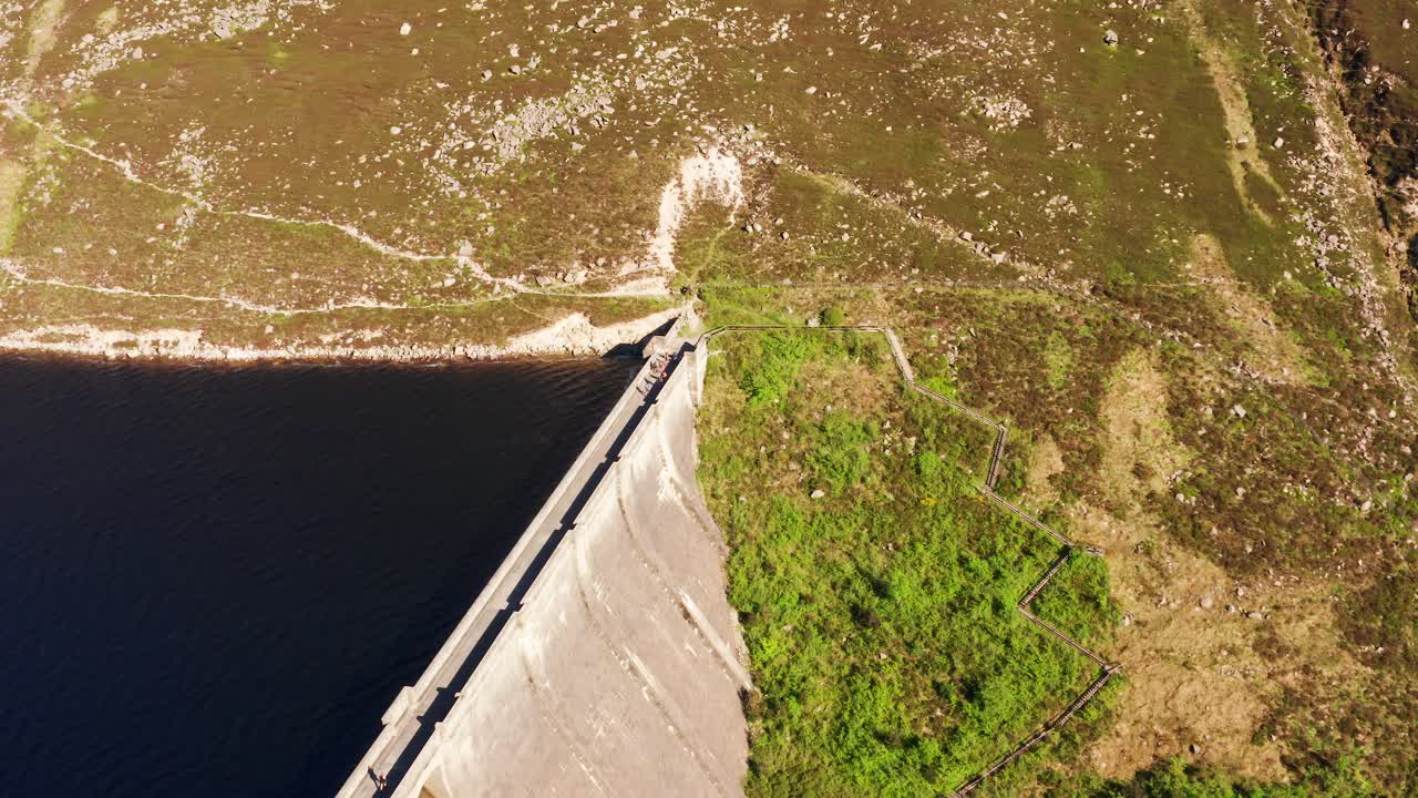 Aerial View of Visitors Walking Along the Ben Crom Reservoir Surrounded by Mourne Mountains