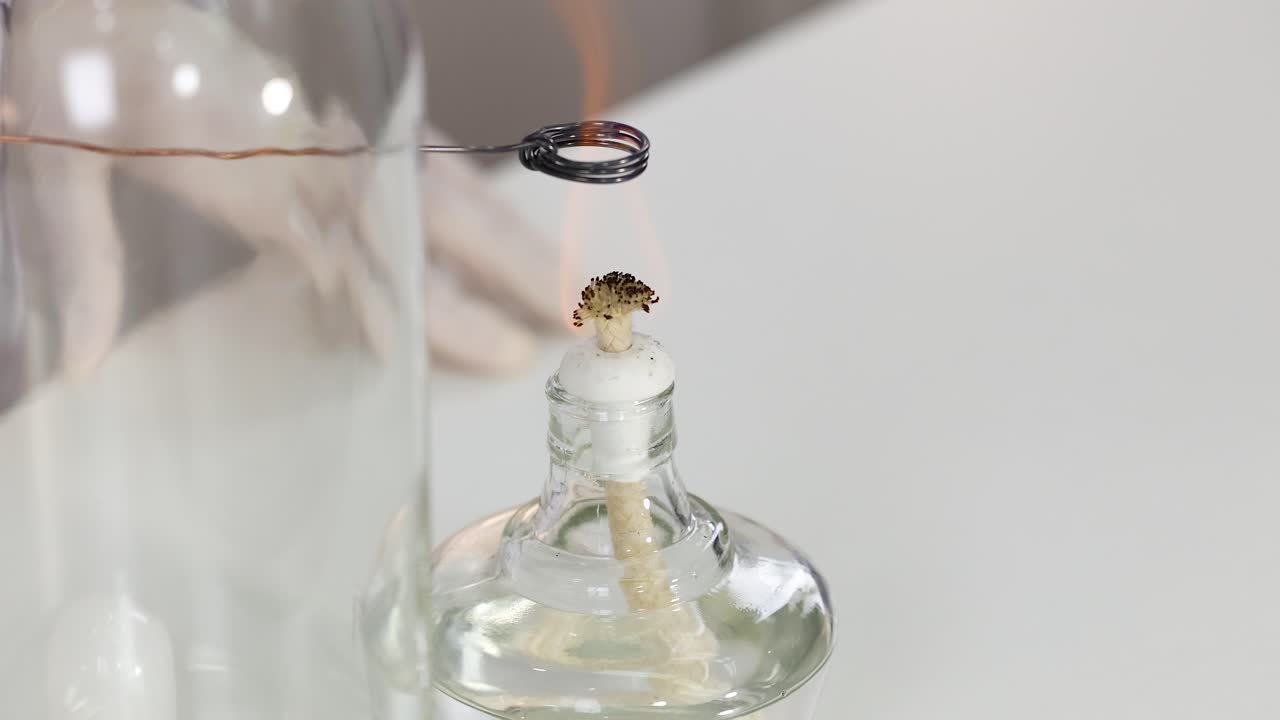 Copper wire oxidizes over acetone flame