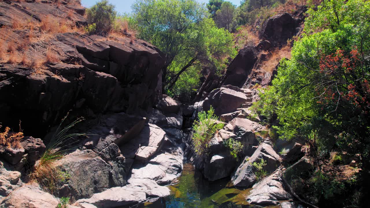 Charco las Vinas in Ojén, Andalusia, Spain, moving down