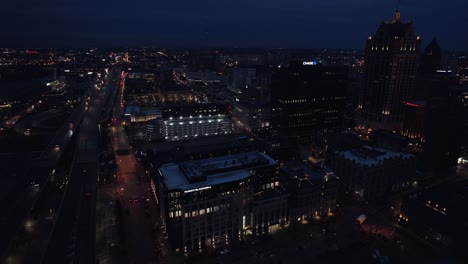 aerial shot of milwaukee cityscape at night time, state of wisconsin, usa