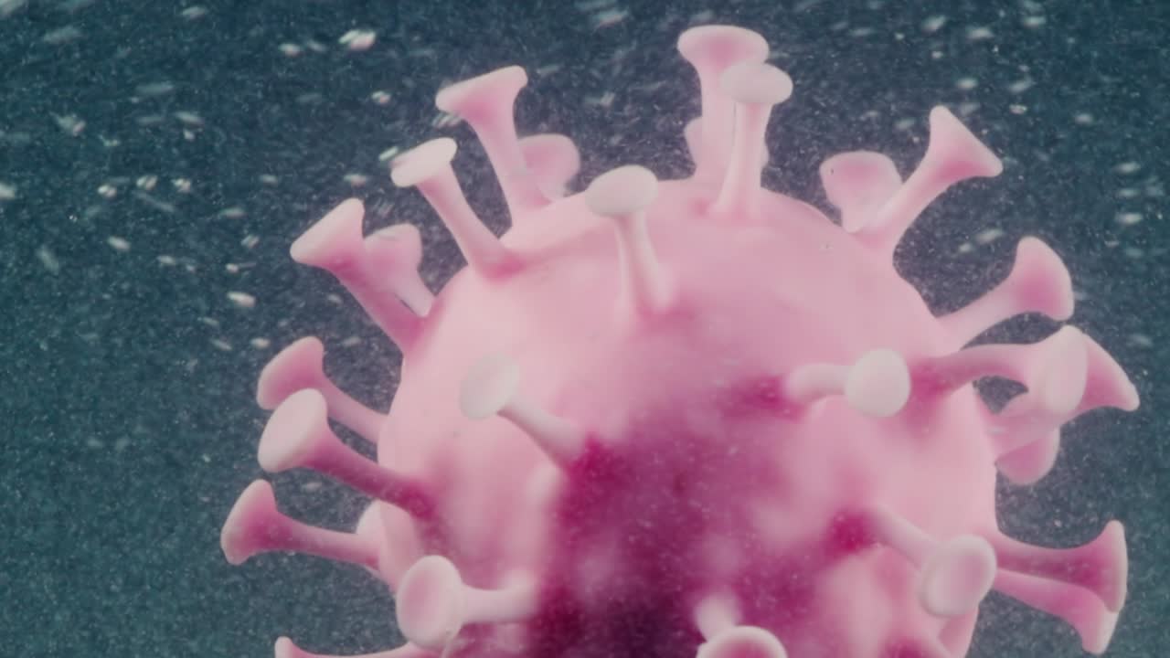 Pandemia COVID-19 Macro primo piano della molecola del virus del microscopio.