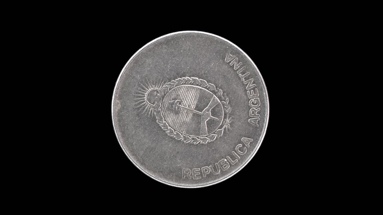 Argentina 1991 1000 australes coin obverse featuring Argentine coat of arms rotating on black background