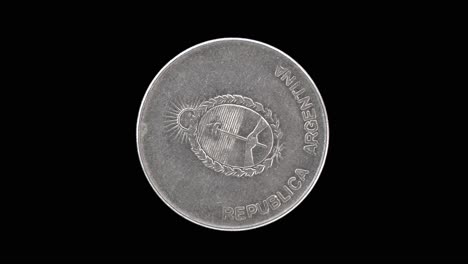 argentina 1991 1000 australes coin obverse featuring argentine coat of arms rotating on black background