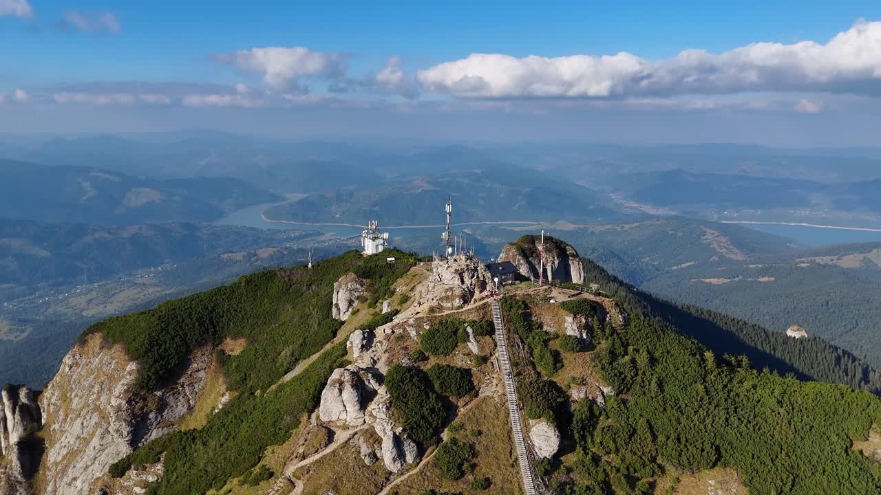 Aerial View of Mountain Peak with Telecommunication Towers