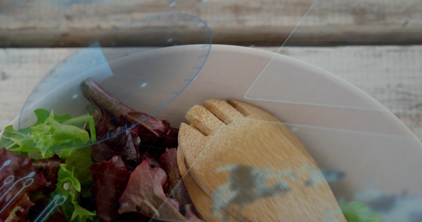 Blue compass overlay drifting in, pale bowl entering as wooden utensils revealing salad for menu