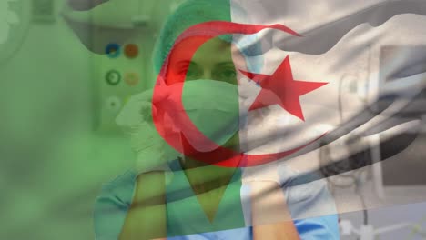 Animation-of-flag-of-algeria-over-caucasian-female-surgeon-with-face-mask