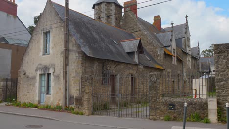 ancient facade of manoir de la hautière on the roadside in nantes, france