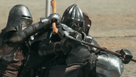 Close-up-tracking-shot-of-fighting-warrior-with-dangerous-weapons