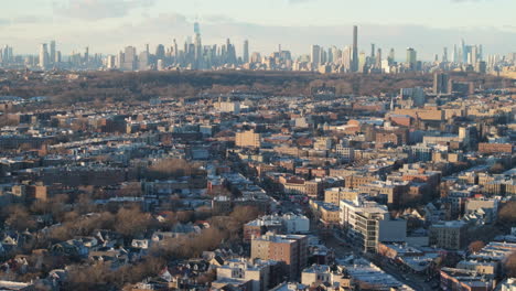 aerial view of flatbush, brooklyn. shot on a winter day with the manhattan skyline in the background