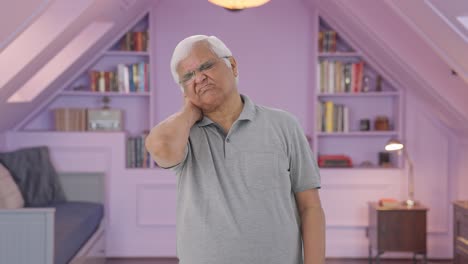 Sick-Indian-old-man-having-a-neck-pain