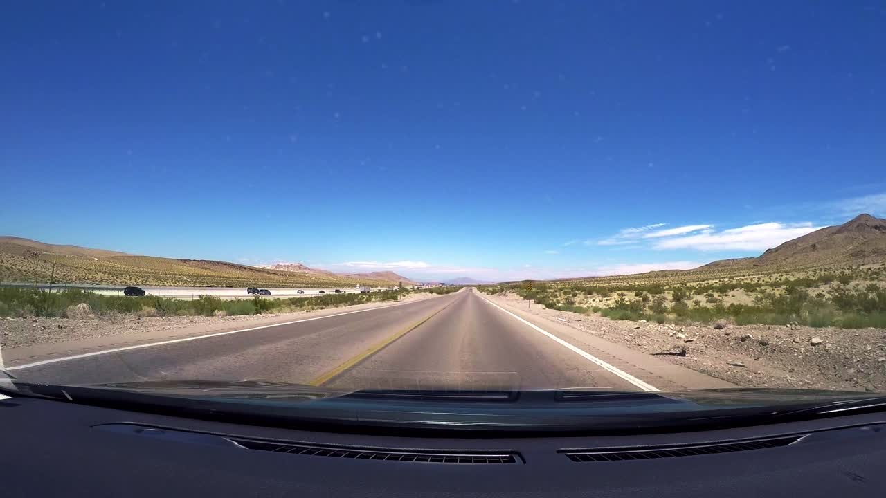 Driving along Las Vegas Blvd throught the desert into Las Vegas