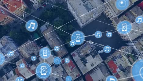 Animation-of-network-of-connections-with-icons-overcityscape-in-background