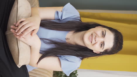 Vertical-video-of-Woman-looking-at-camera-confused.