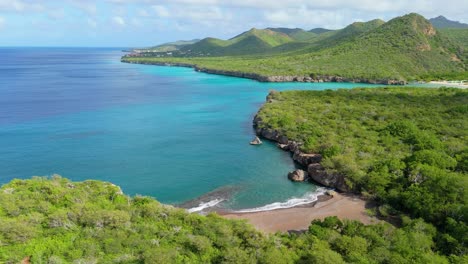 drone obit around playa santu pretu tropical getaway with christoffelberg and westpunt in distance