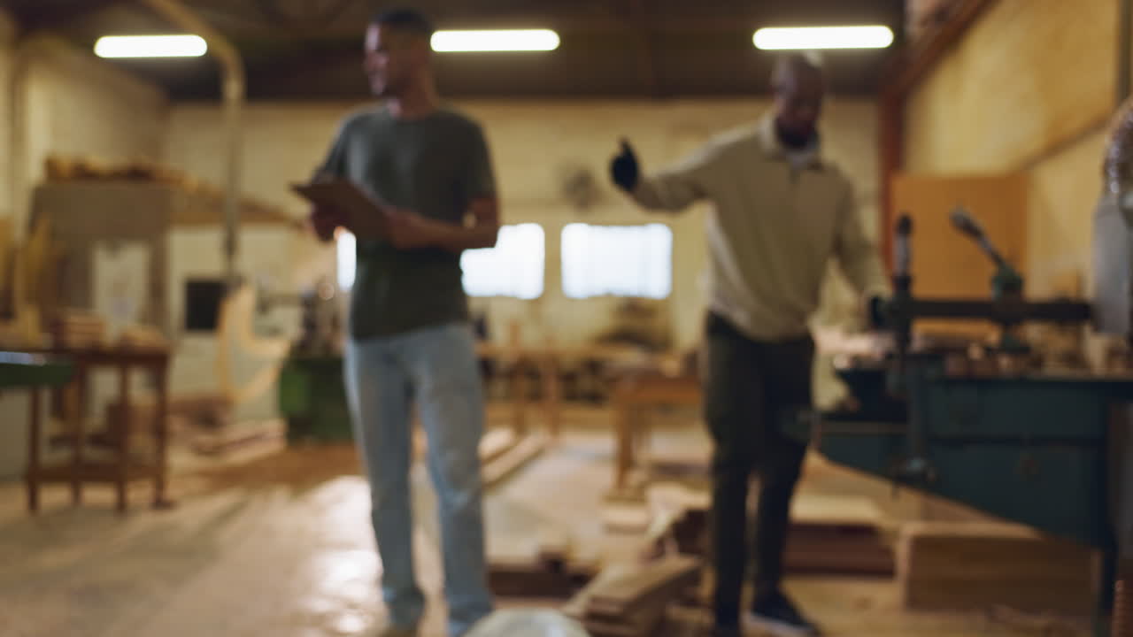 Men working in a woodworking workshop