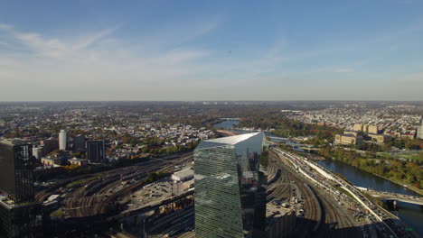 aerial view of a helicopter flying over the schuylkill river, fall evening in philadelphia, usa