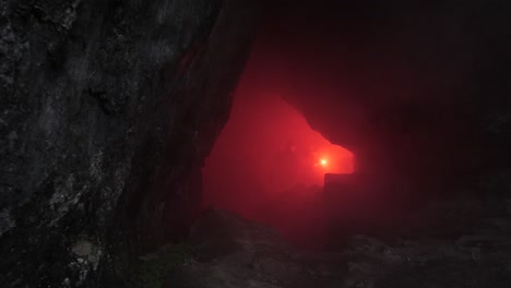 mysterious red light in a dark cave