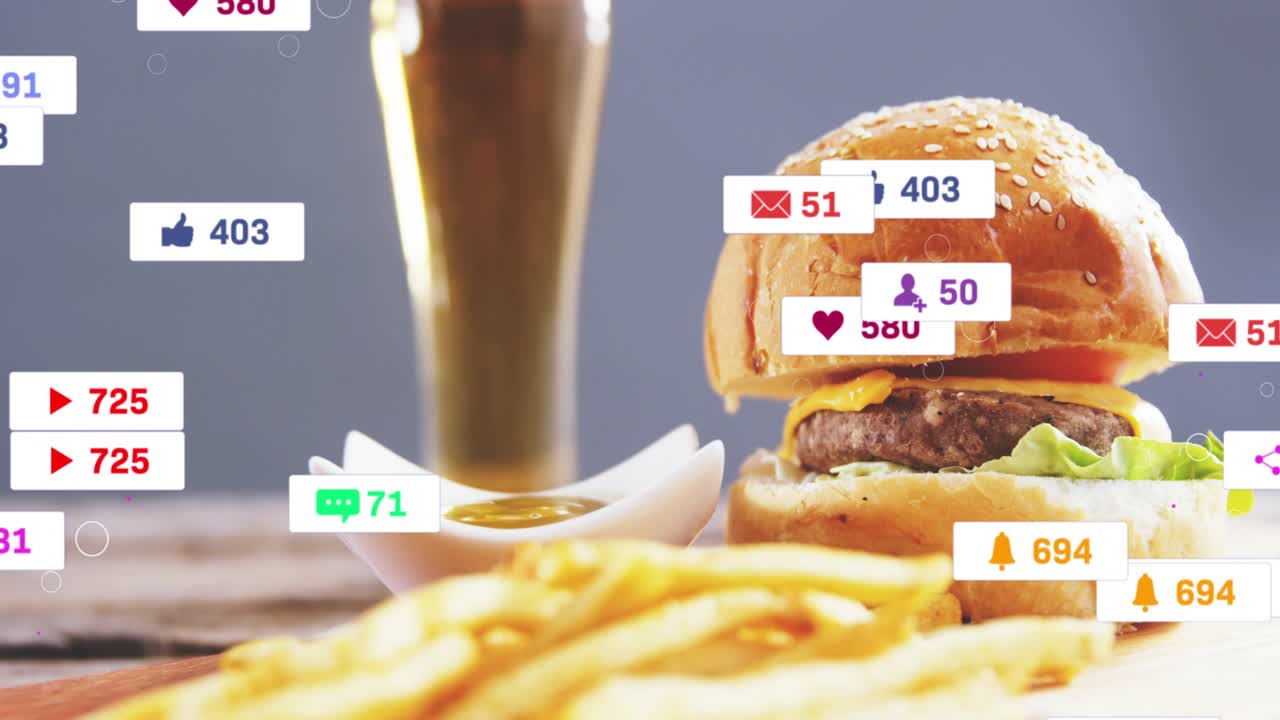 Burger and beer, on ping badges popping, multiplying, filling, condensing and fading to reveal meal