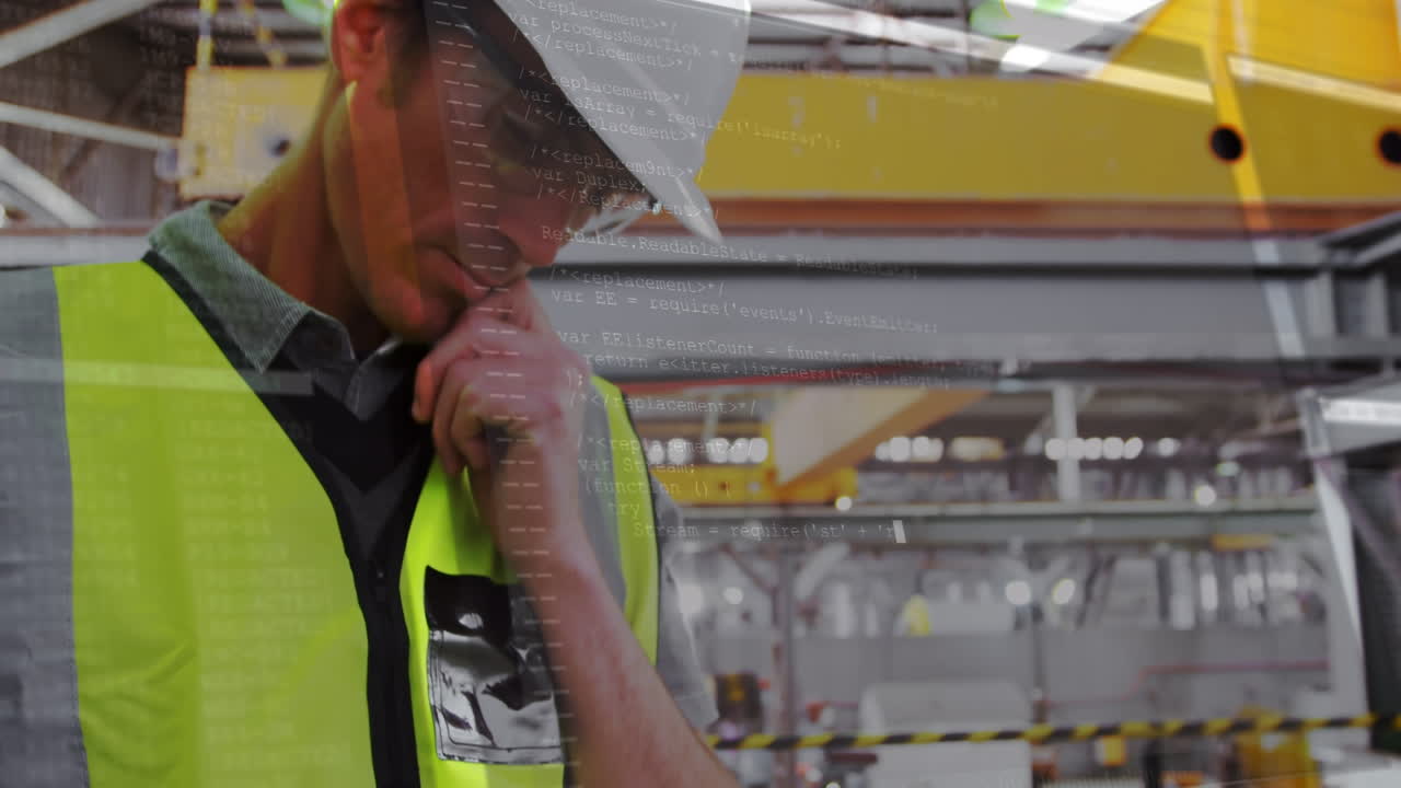 Screen with data processing against caucasian male engineer using digital tablet at a factory