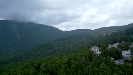 alishan national forest in taiwan, showcasing mountains and greenery, aerial view